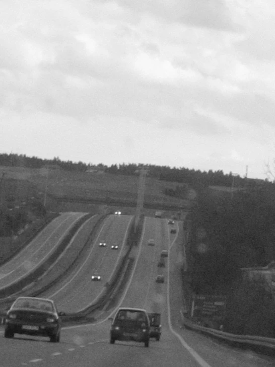 a black and white po of traffic on the highway