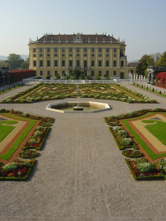 a large building with flowers all over it