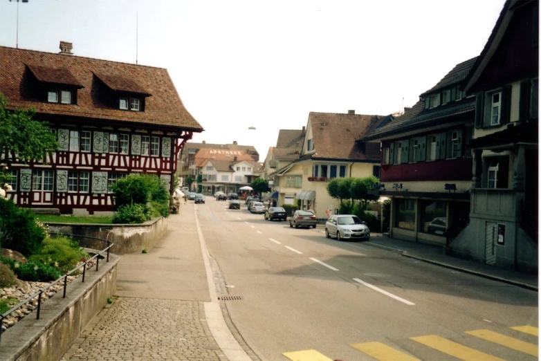 a street with a lot of parked cars