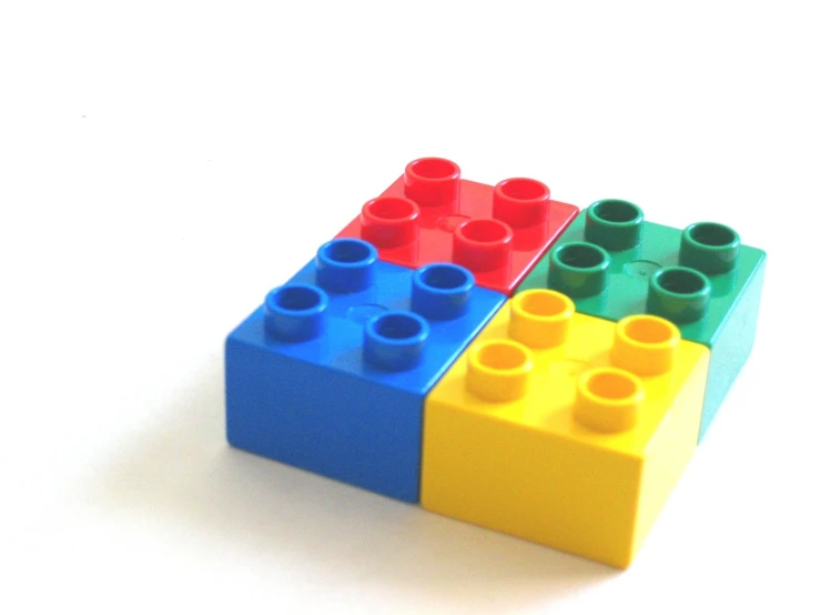 several lego style bricks on white background