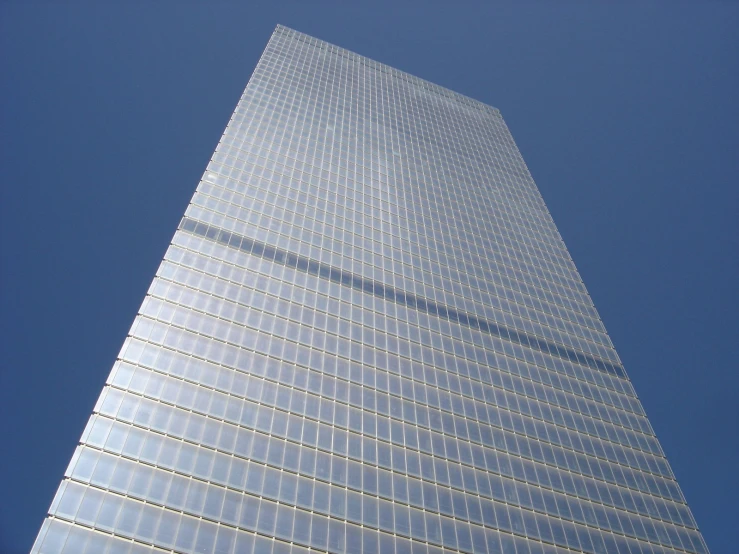 a very tall building with many glass windows