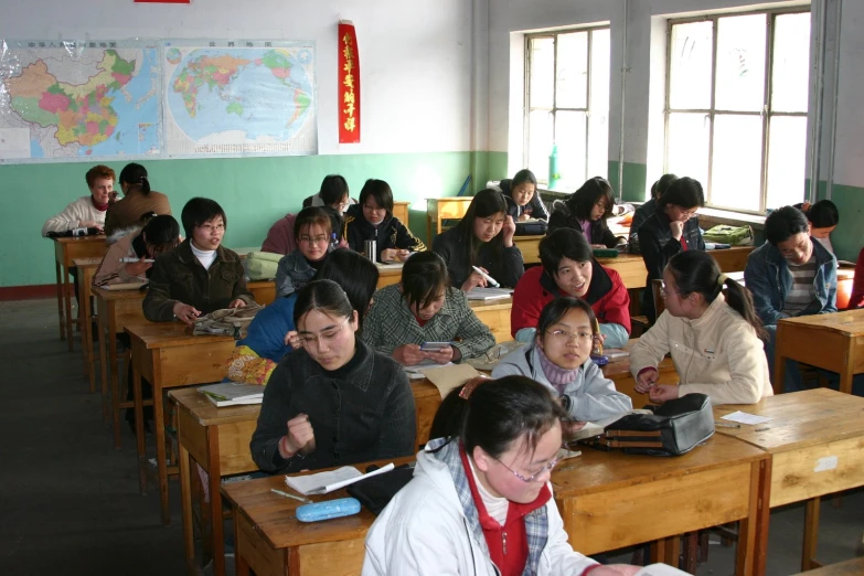group of students at desk in classroom area