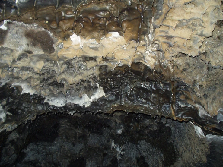 the texture of water and a wall of ice and ice melt