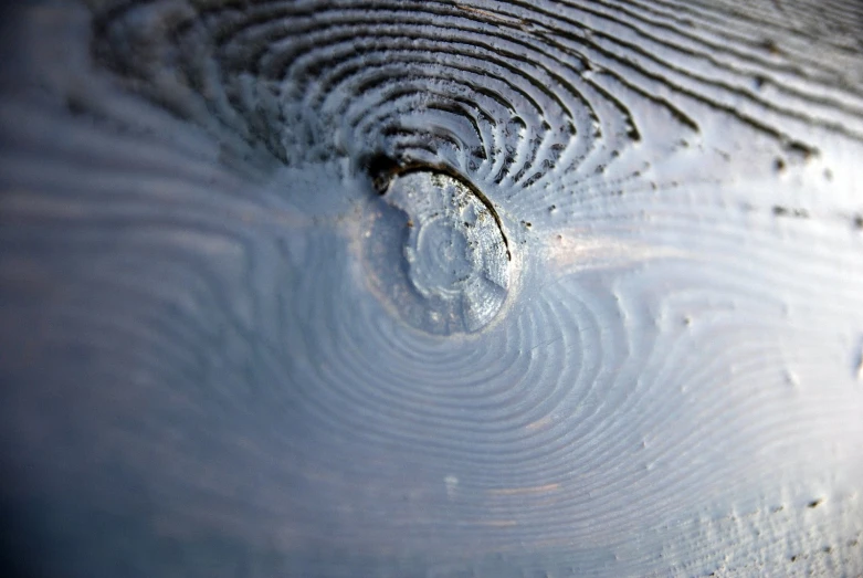 a wood piece with several holes, like this design