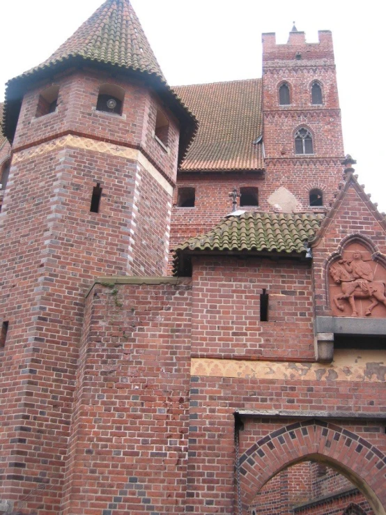 a large stone structure with an arch underneath