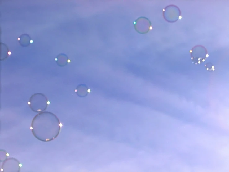 there are many bubbles floating in the air