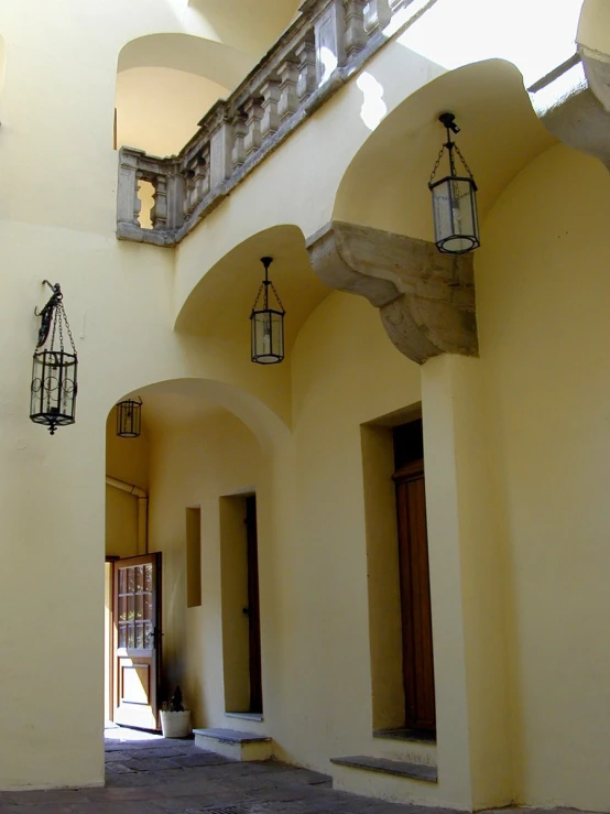 light brown door and pillars and windows in a building