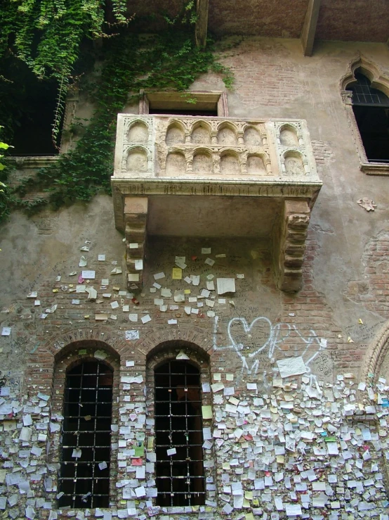 an aerial view of a building with window and graffiti