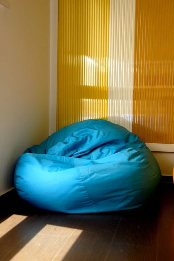a bean bag bed on the floor in a room