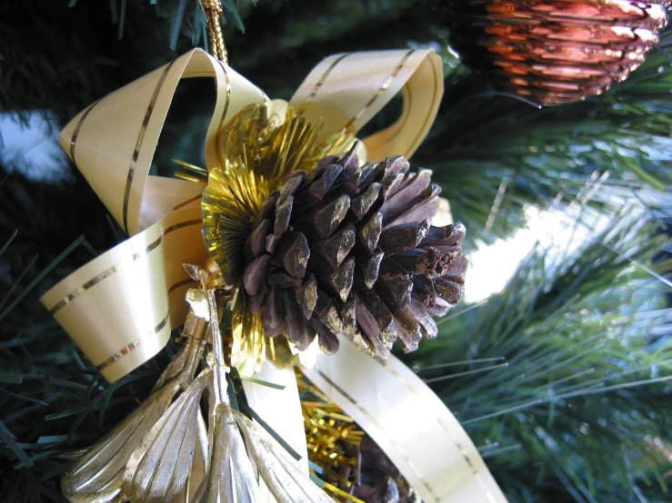 a close up of some decorations on a tree