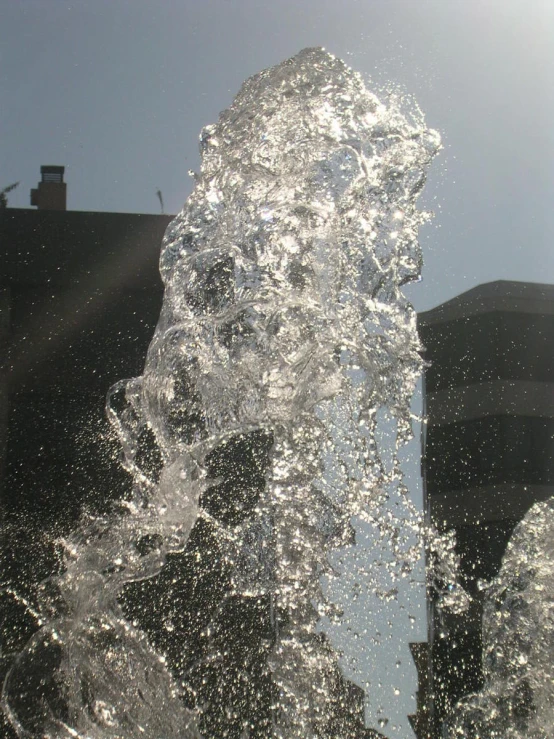 water is spewing out from the top of an air vent