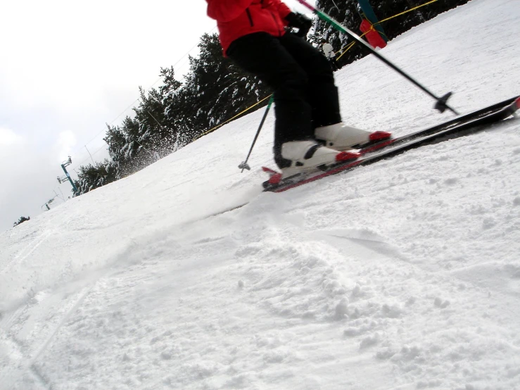 the skier has his feet out of the water