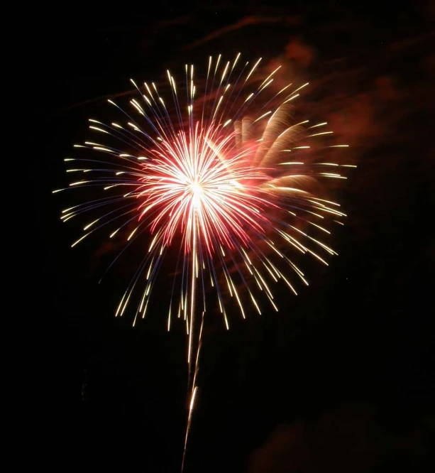 fireworks being lit up in the night sky