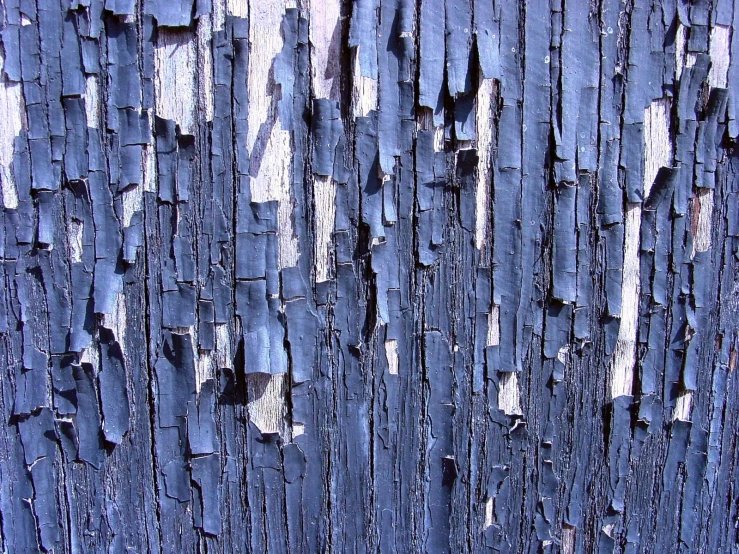 wooden boards with ed paint and peeling paint