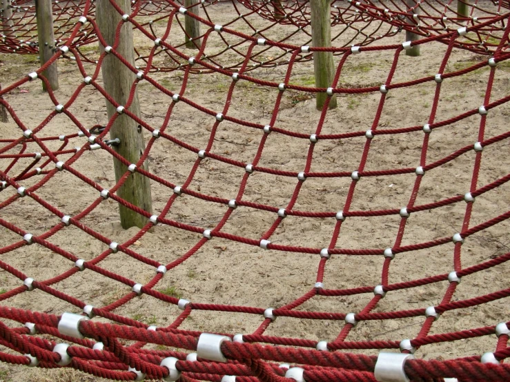 there are red ropes around an empty park