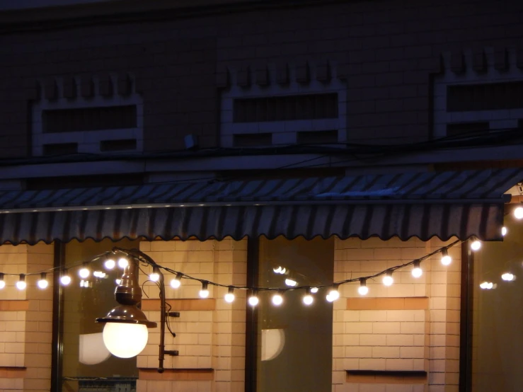 an image of a building that has christmas lights