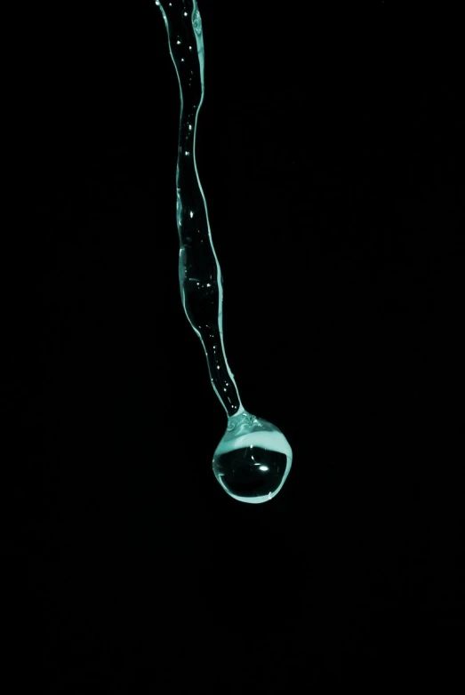 a liquid filled with water in the dark