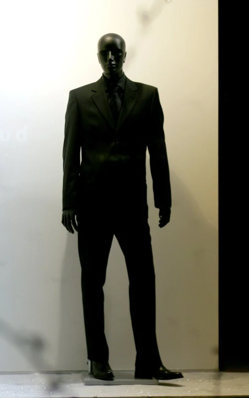 a mannequin dressed in a business suit