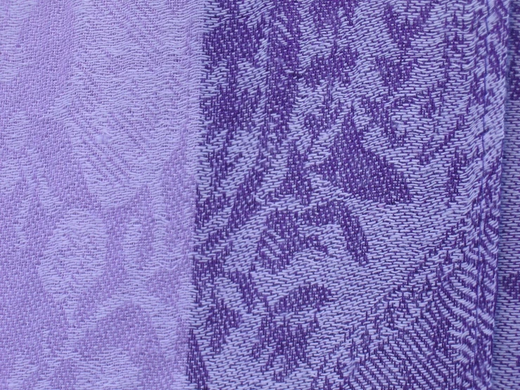 a close up s of the fabric material that looks like a purple cloth