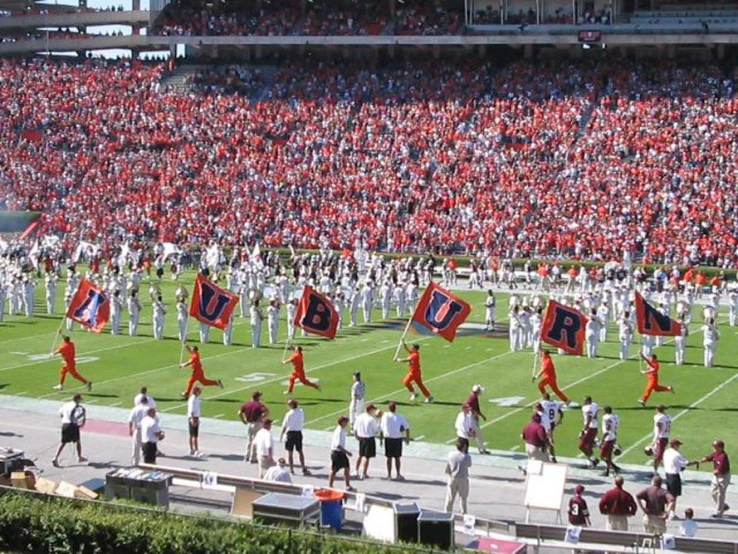 the football players are playing on the field