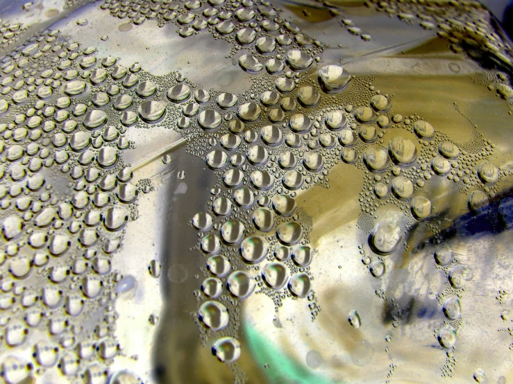 close up of water bubbles on a glass