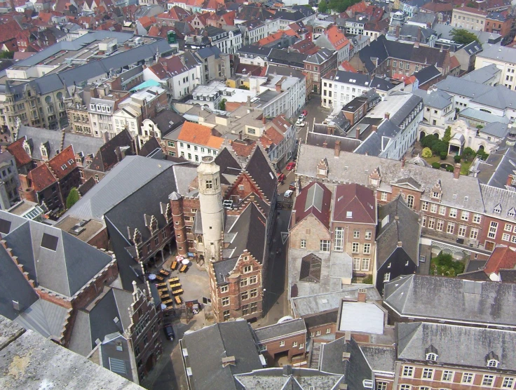 a view of some buildings from above in the distance