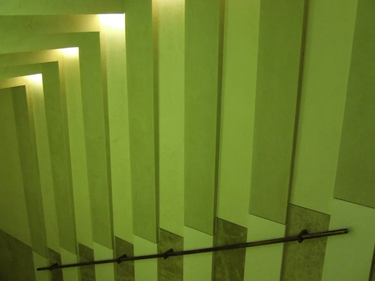 the walls are lined with vertically striped columns