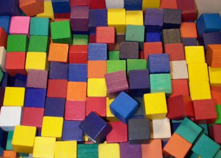 close up of lots of colored block toys on a surface