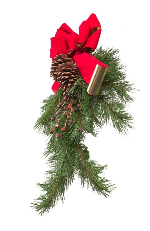 a large christmas wreath with a red bow and pine cones