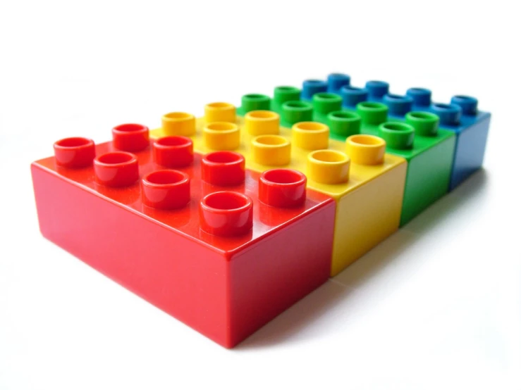 a stack of legos with red, blue and yellow lego blocks