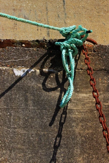 a piece of rope that is hanging down
