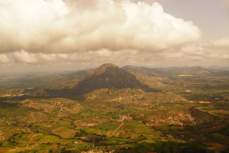 the view from the sky looking over a beautiful, mountainous valley