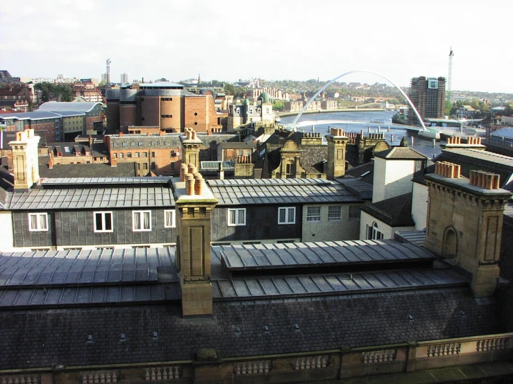 a view of some old buildings and a tall structure