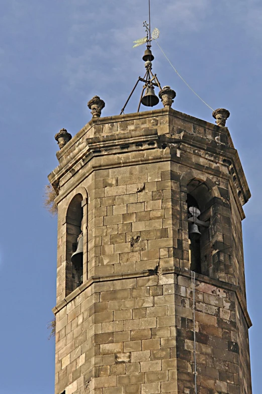 an old building with a large clock at the top