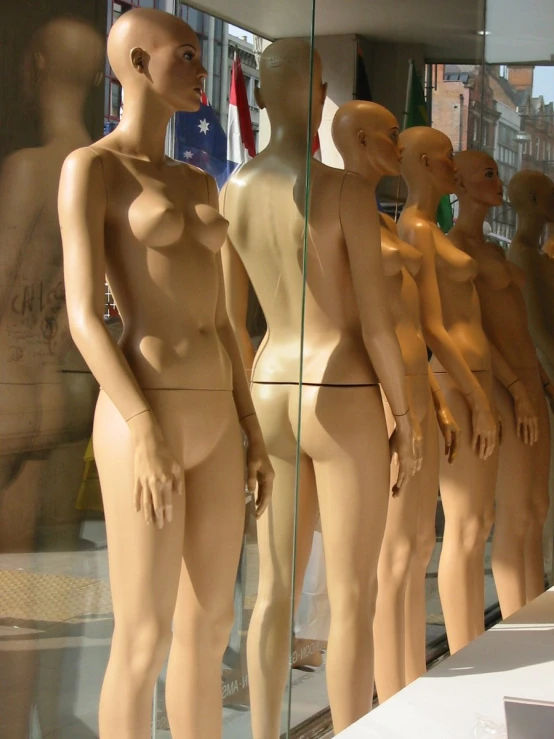 a window display with a variety of  mannes