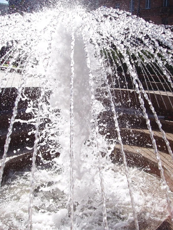 a water fountain with jets running down the center