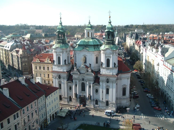 a po of a church and other buildings in a city