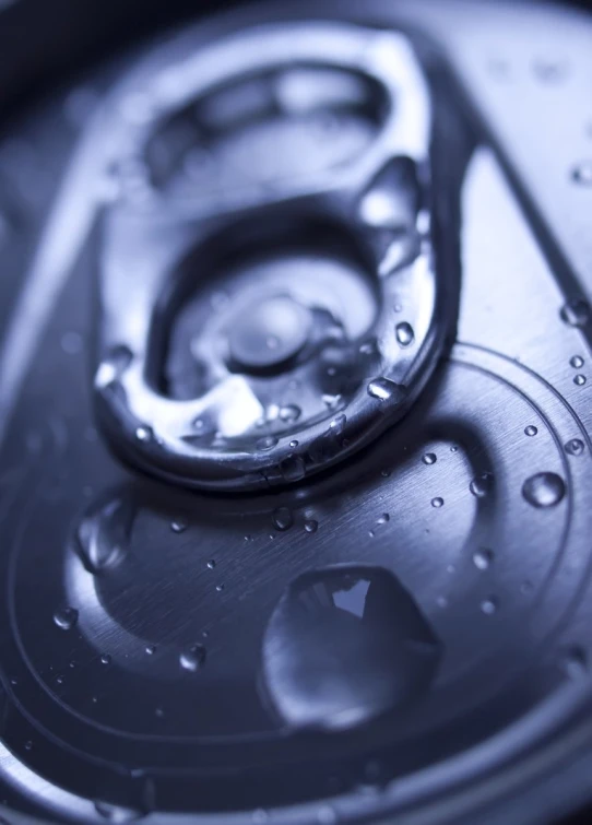 a watch is shown with drops of water on it