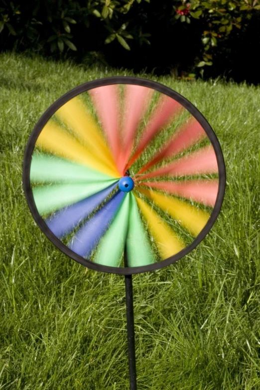 a colorful wind spin is seen on a lawn