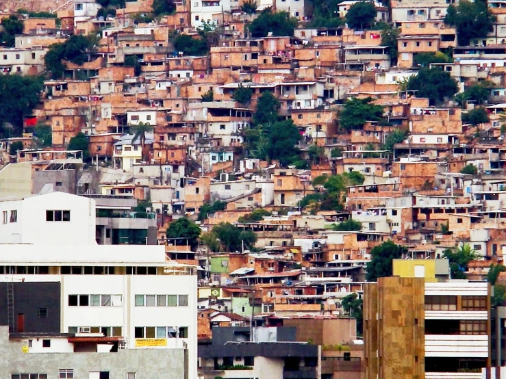 a hill top with a lot of brown and white buildings