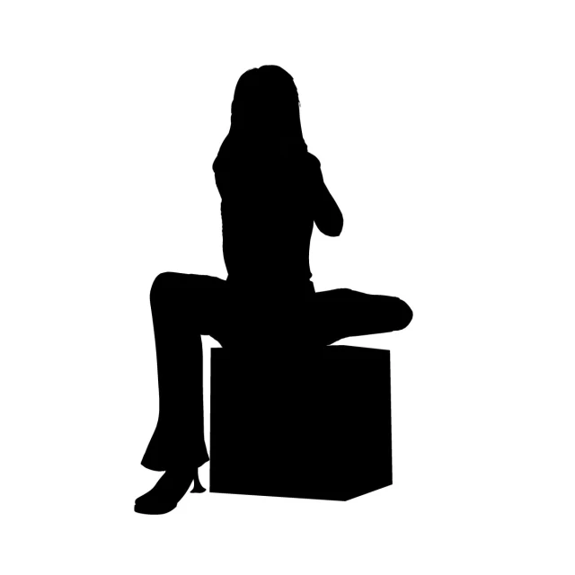 a woman that is sitting down and posing