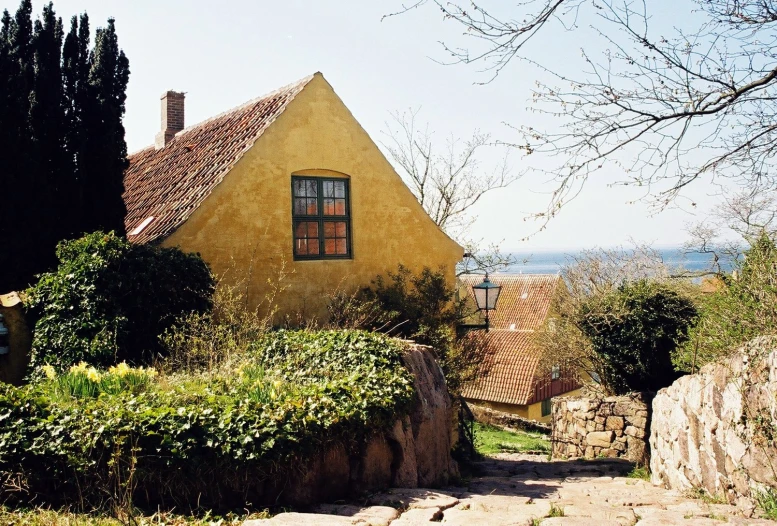 an alley that leads to a small village