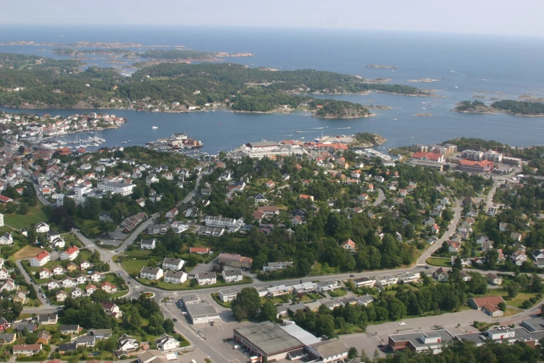 an aerial view shows the town, streets and water
