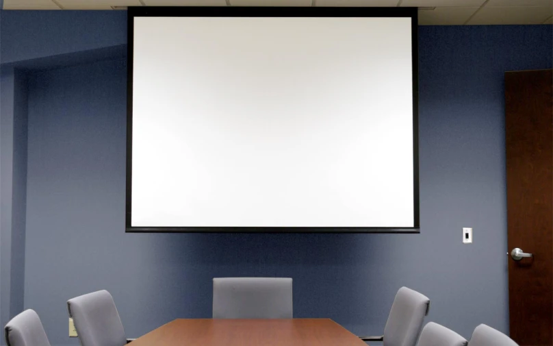 conference room with large flat panel screen and chairs