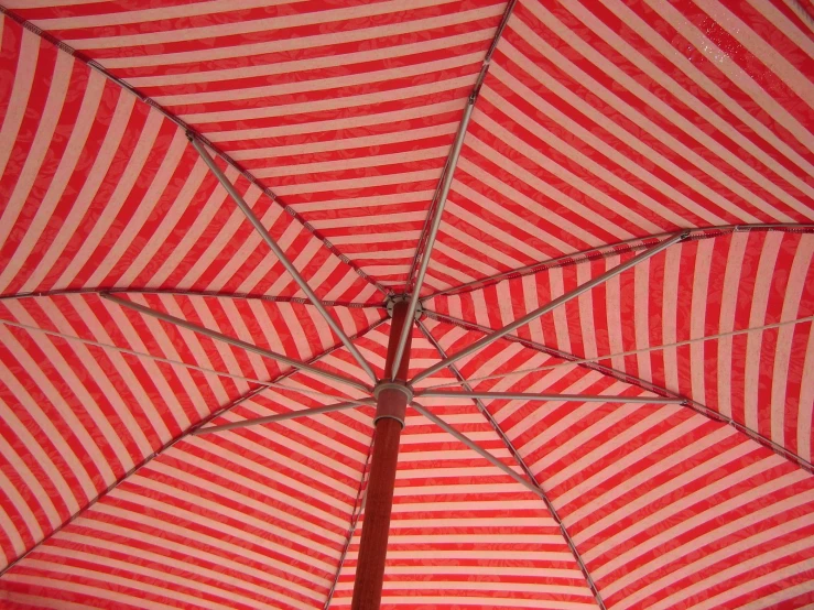an open striped umbrella with lines
