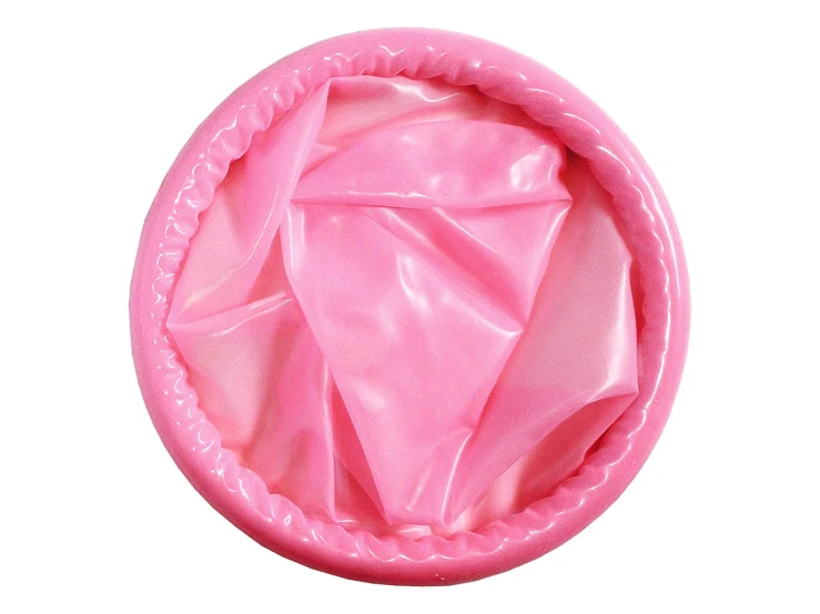 a pink plastic food dish covered with plastic covering