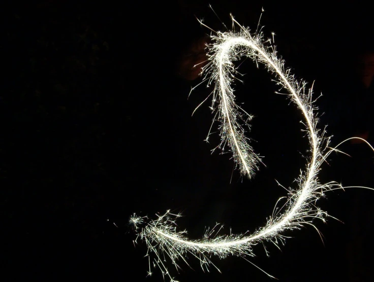 a fireworks display made to look like a letter