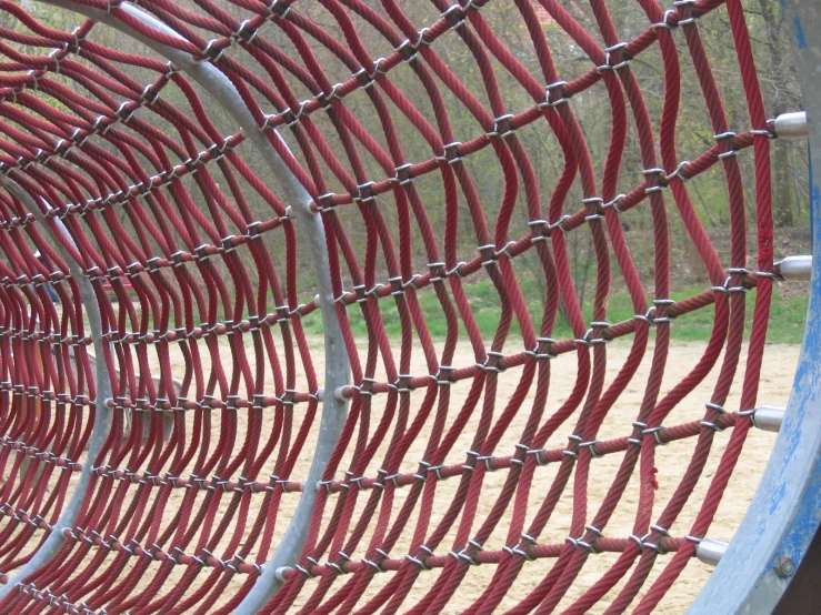 a pipe with wires in the shape of a tunnel