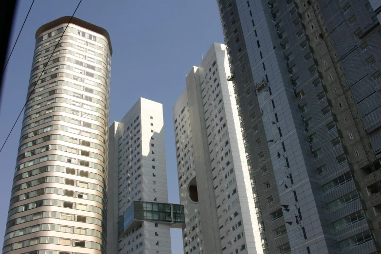 a few buildings with towers sticking out of them