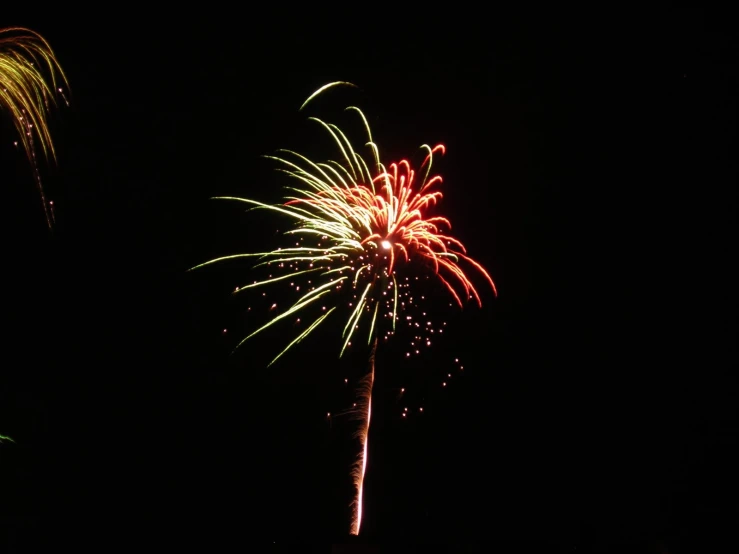 fireworks on dark night in the sky with many colors